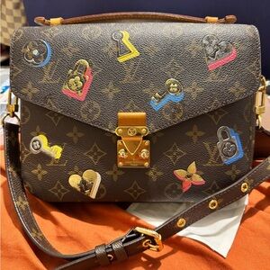 Louis Vuitton Pouchette Metis Love Lock Limited Edition Crossbody Bag